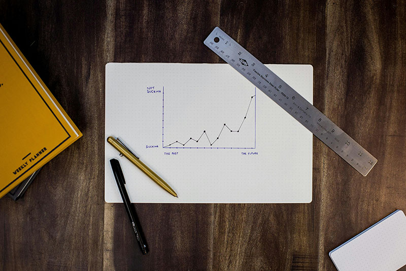 Technical documentation is crucial for your startup. An image of a document being written, with pens and ruler